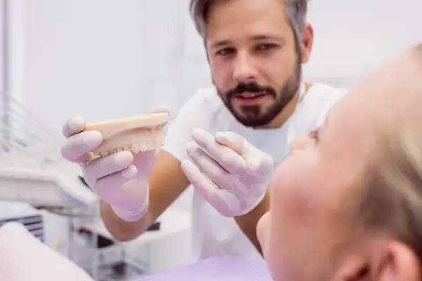 Proceso de colocación de dentaduras sobre implantes